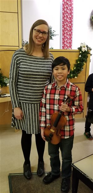 With violin student, Ryder